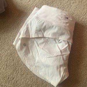 White lululemon shorts. Size 4. tag is ripped.